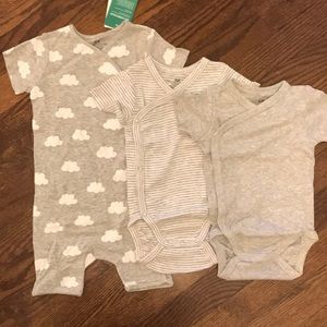 Set of three H&M organic cotton bodysuits
